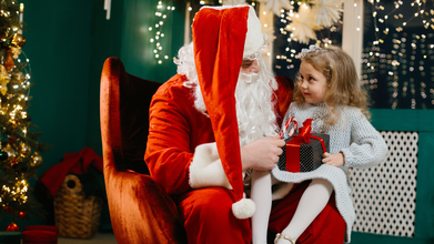 child on Santa's lap (iStock)