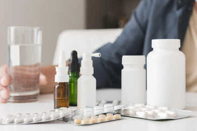 close-up-medicine-containers-table