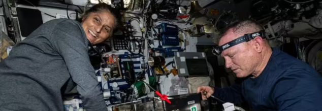 NASA astronauts Butch Wilmore and Suni Williams prepare orbital hardware for installation inside the International Space Station. (NASA)